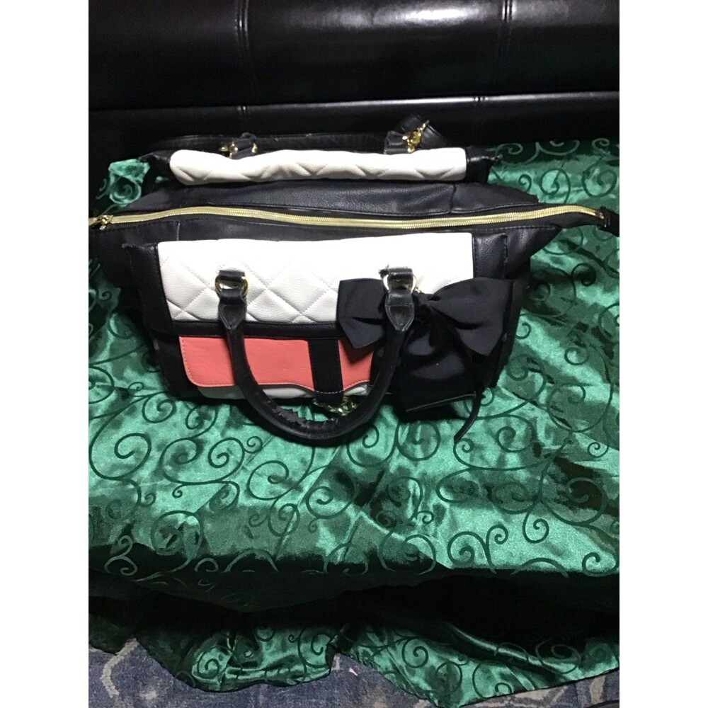 Betsey Johnson handbag with pink and white quilted stripe